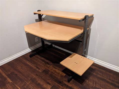Having the 2 boards on the in the height adjustable rails is also a plus. . Ikea jerker desk